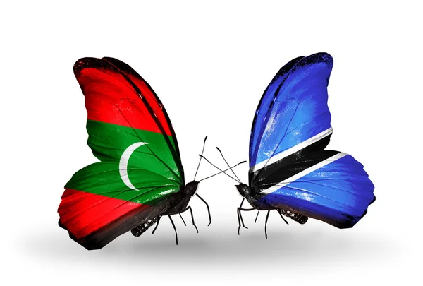 Motýli s příznaky Maledivy a Botswana — Stock fotografie