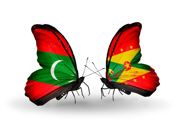 Farfalle con bandiere Maldive e Grenada — Foto Stock