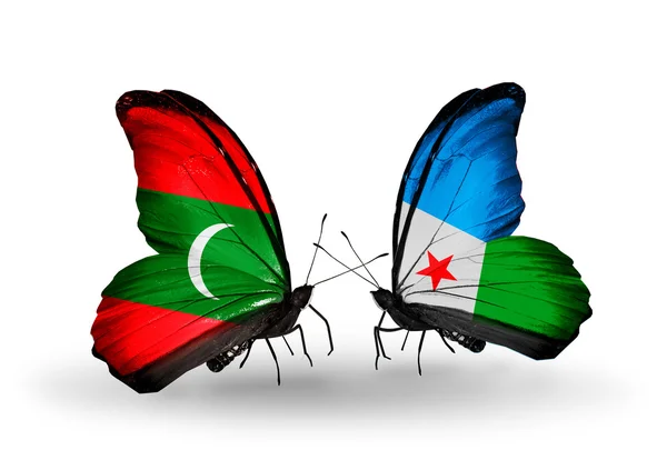 Butterflies with Maldives and Djibouti flags — Stock Photo, Image