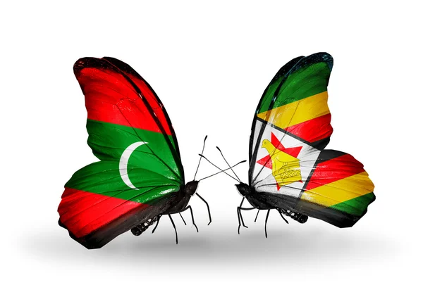 Farfalle con le Maldive e bandiere dello Zimbabwe — Foto Stock