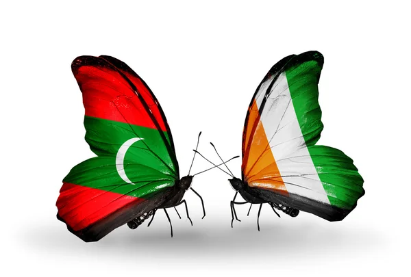 Butterflies with Maldives and Cote Divoire flags — Stock Photo, Image