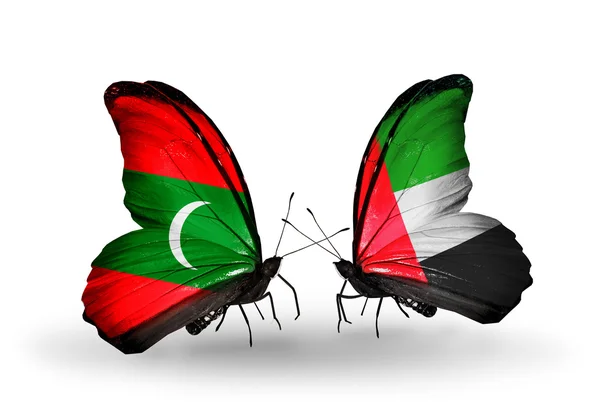 Butterflies with Maldives and UAE flags — Stock Photo, Image