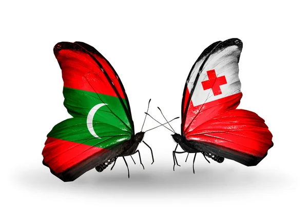 Farfalle con bandiere Maldive e Tonga — Foto Stock