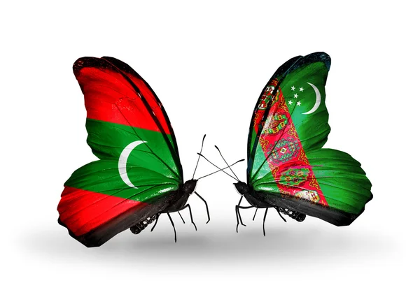 Butterflies with  Maldives and Turkmenistan flags — Stock Photo, Image