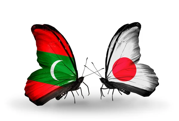 Papillons aux Maldives et drapeaux du Japon — Photo