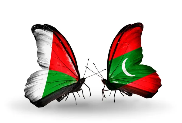 Бабочки с флагом Мадагаскара и Мальдив — стоковое фото