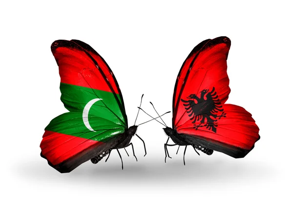 Butterflies with Maldives and Albania flags — Stock Photo, Image