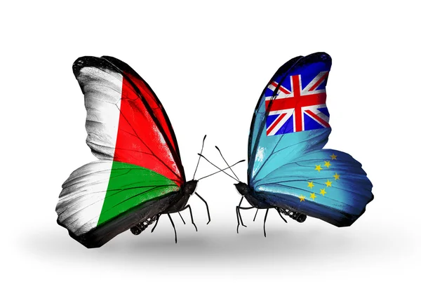 Butterflies with Madagascar and Tuvalu flags — Stock Photo, Image