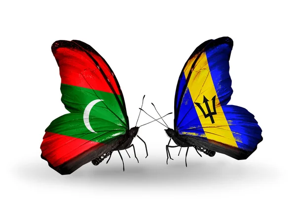 Papillons avec drapeaux des Maldives et de la Barbade — Photo