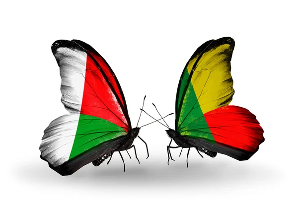 Butterflies with Madagascar and  Benin flags — Stock Photo, Image