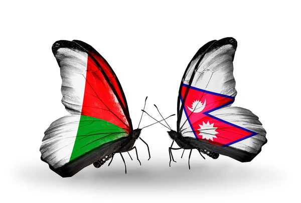 Motyle z Madagaskaru i Nepalu flagi — Zdjęcie stockowe