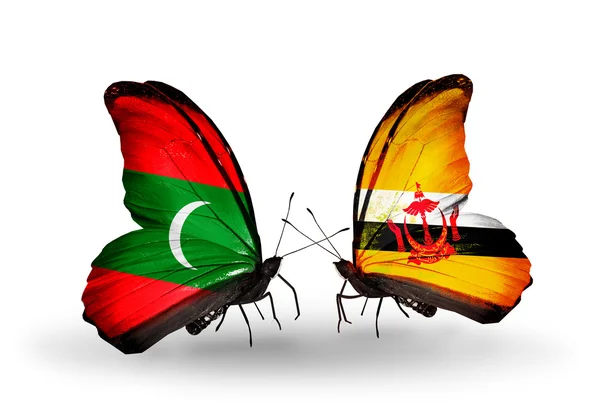 Vlinders met vlaggen van de Maldiven en Brunei — Stockfoto