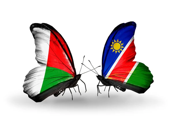 Farfalle con bandiere Madagascar e Namibia — Foto Stock