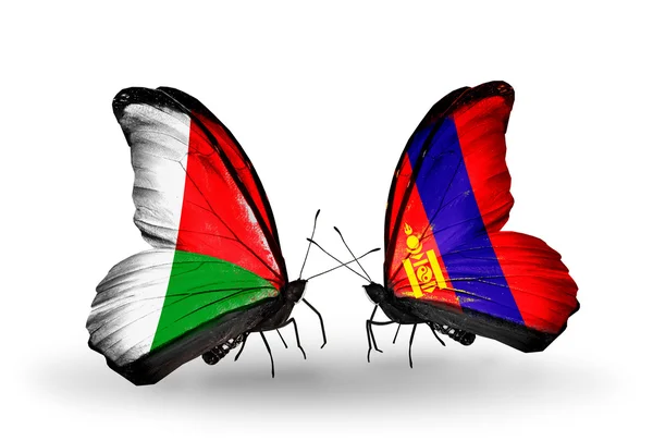 Butterflies with Madagascar and Mongolia flags — Stock Photo, Image