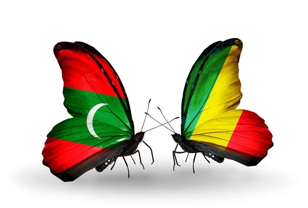 Papillons aux Maldives et drapeaux Kongo — Photo