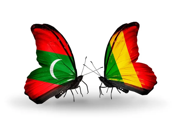 Schmetterlinge mit Malediven und Mali-Flaggen — Stockfoto