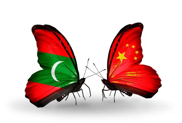 Vlinders met vlaggen van de Maldiven en China — Stockfoto