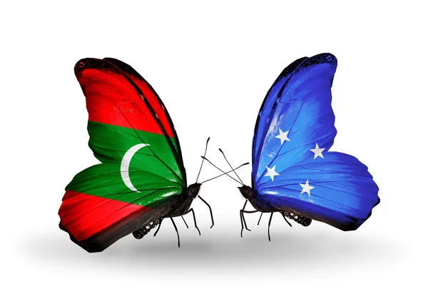 Butterflies with Maldives and Micronesia flags — Stock Photo, Image