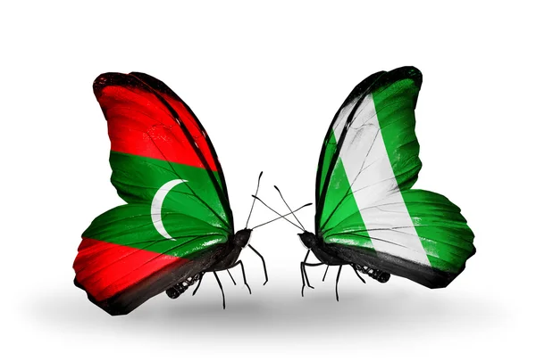 Butterflies with Maldives and Nigeria flags — Stock Photo, Image