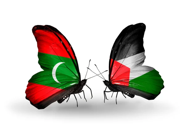 Butterflies with Maldives and Palestine flags — Stock Photo, Image