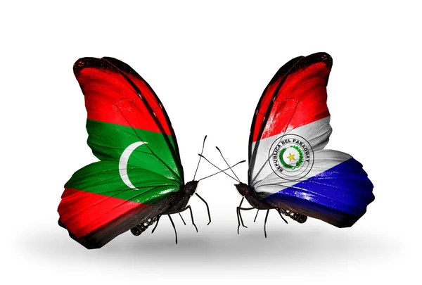 Butterflies with Maldives and Paraguay flags — Stock Photo, Image