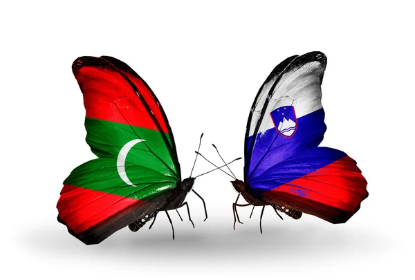 Butterflies with Maldives and Slovenia flags — Stock Photo, Image