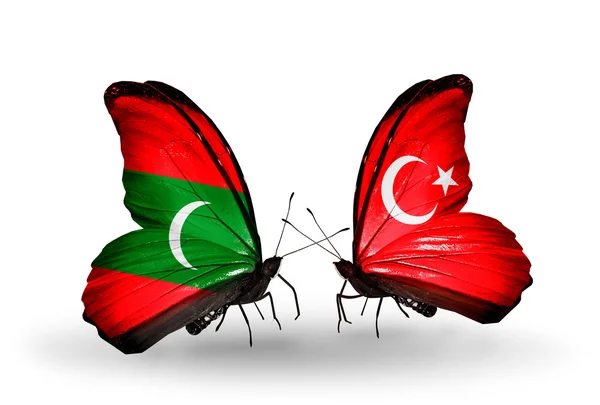 Butterflies with Maldives and Turkey flags — Stock Photo, Image