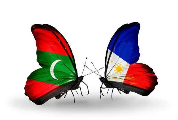 Butterflies with Maldives and Philippines flags — Stock Photo, Image