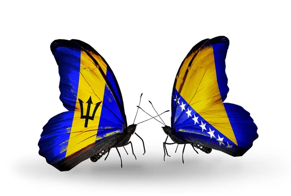 Butterflies with Barbados and Bosnia and Herzegovina flags — Stock Photo, Image