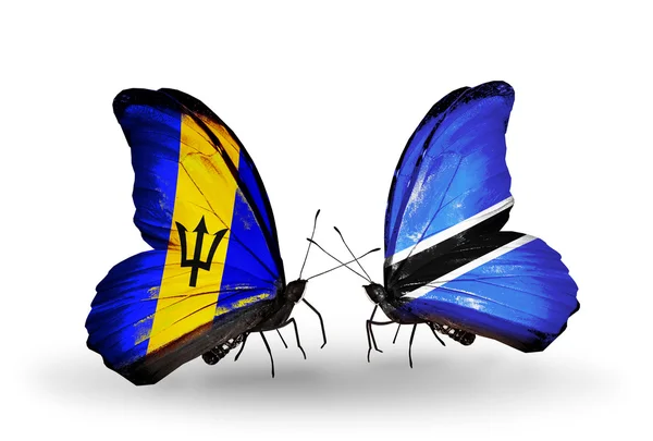 Butterflies with Barbados and Botswana flags — Stock Photo, Image