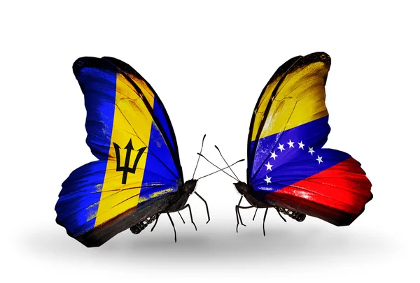 Farfalle con bandiere Barbados e Venezuela — Foto Stock
