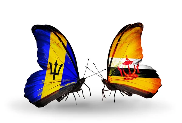 Mariposas con banderas de Barbados y Brunei — Foto de Stock