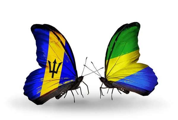 Barbados ve gabon bayrakları taşıyan kelebekler — Stok fotoğraf