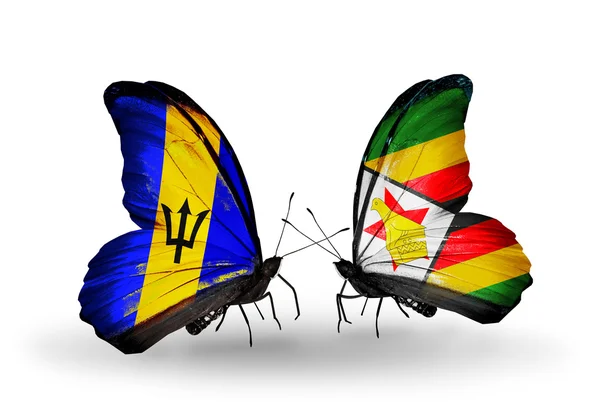 Farfalle con bandiere Barbados e Zimbabwe — Foto Stock