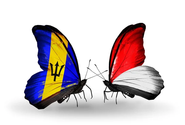 Butterflies with Barbados and Monaco, Indonesia flags — Stock Photo, Image