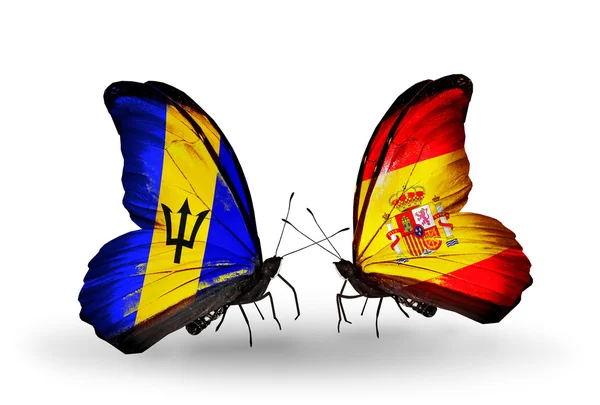 Butterflies with Barbados and Spain  flags — Stock Photo, Image