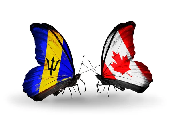 Schmetterlinge mit Barbados und Kanada-Flaggen — Stockfoto