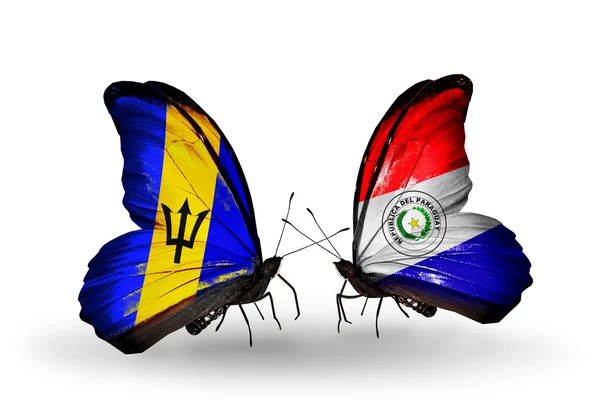 Butterflies with Barbados and Paraguay flags — Stock Photo, Image