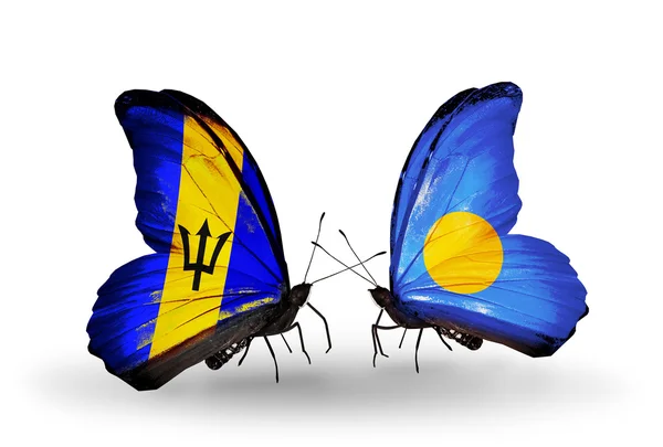 Butterflies with Barbados and Palau flags — Stock Photo, Image