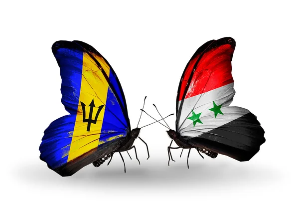 Barbados ve Suriye bayrakları taşıyan kelebekler — Stok fotoğraf