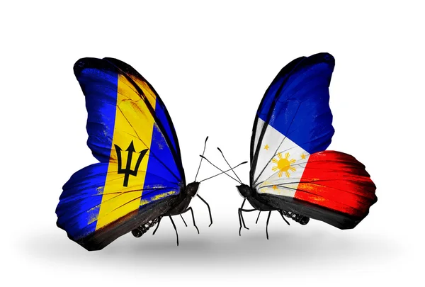 Fjärilar med Barbados och Filippinerna flaggor — Stockfoto