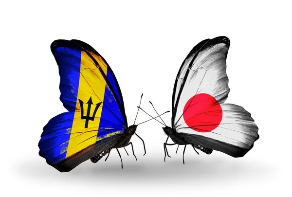 Fjärilar med Barbados och Japan flaggor — Stockfoto