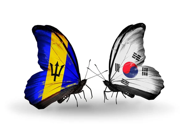 Vlinders met vlaggen Barbados en Zuid-Korea — Stockfoto