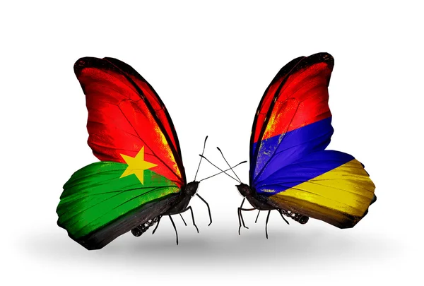 Deux papillons avec des drapeaux — Photo