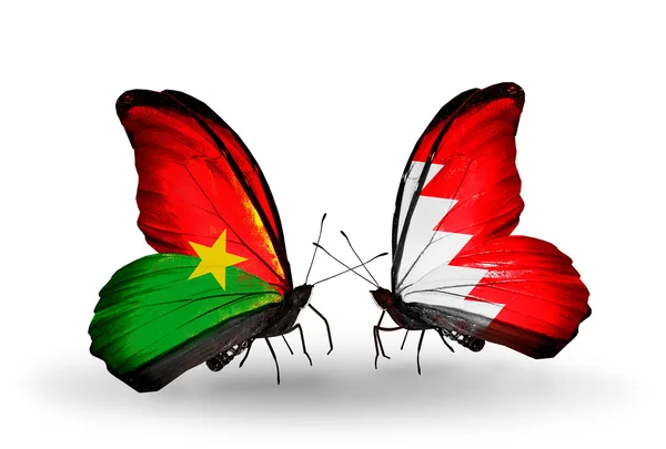 Twee vlinders met vlaggen — Stockfoto
