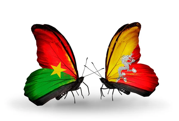 Две бабочки с флагами — стоковое фото