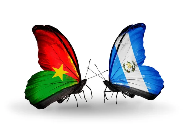 Dwa motyle z flagami — Zdjęcie stockowe