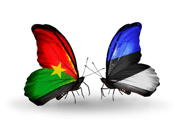 Two butterflies with flags — Stock Photo, Image