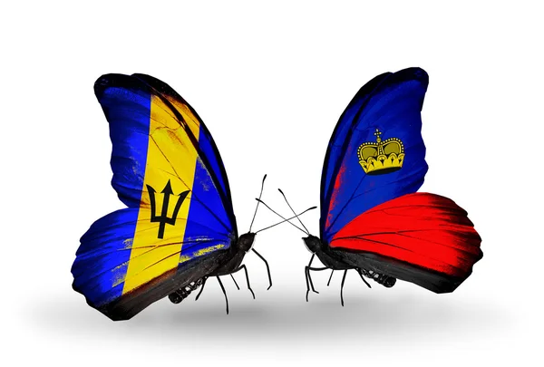 Two butterflies with flags — Stock Photo, Image