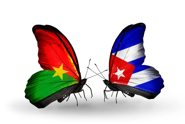 Two butterflies with flags — Stock Photo, Image